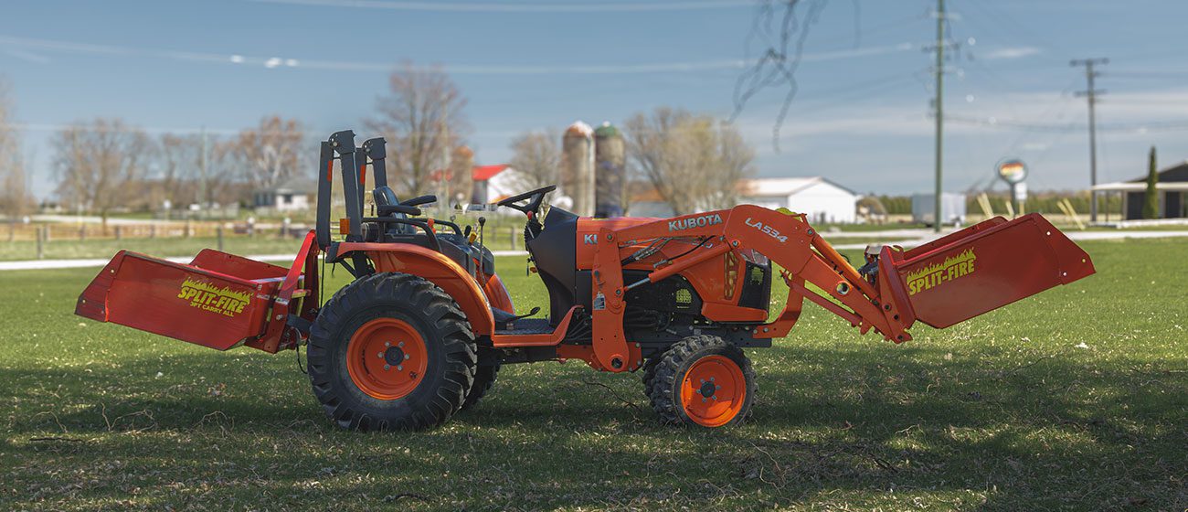 Split-Fire high cap bucket mounted to kubota bx