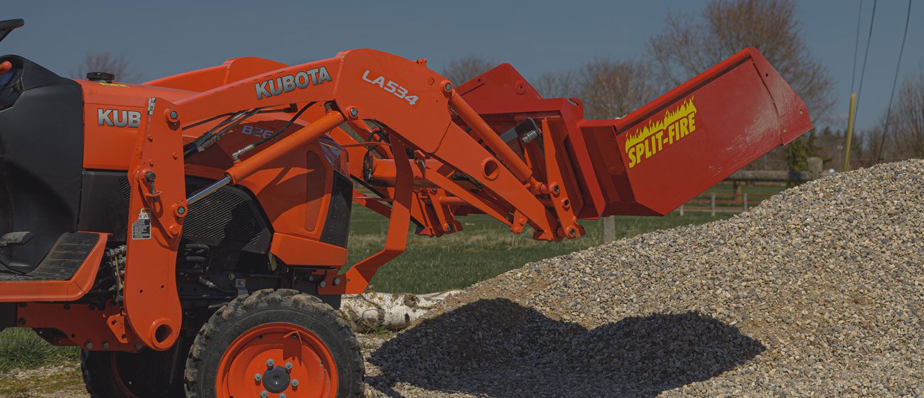 Split-Fire high cap bucket mounted to kubota bx